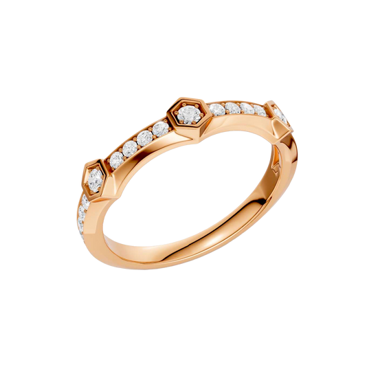 An angled view of a 14K rose gold geometric ring, showcasing the geometric links and pavé diamonds.