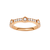 A top-down view of a 14K rose gold ring with a series of geometric links and bezel-set diamonds.