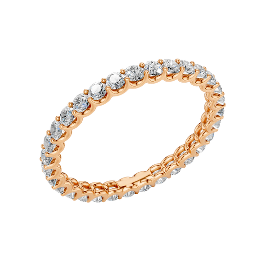 Amorati Diamonds, Infinity Loop Full Eternity Ring, an angled view of a 10K rose gold eternity band, showcasing the brilliant row of round jewels.