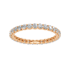 Amorati Diamonds, Infinity Loop Full Eternity Ring, a top-down view of a 10K rose gold eternity band with a continuous line of brilliant round jewels.