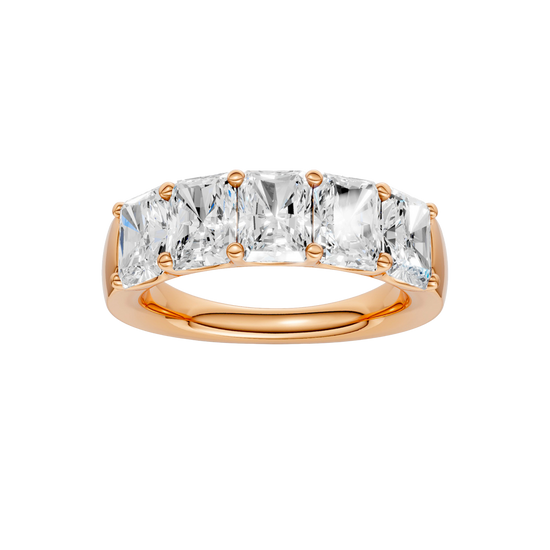 A top-down view of a 14K rose gold wide band ring with five horizontally-set emerald-cut diamonds, with the center one being larger.