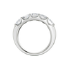 A side-profile view of a 14K white gold wide band ring, showing the tapered design and the five diamonds.