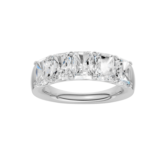 A top-down view of a 14K white gold wide band ring with five horizontally-set emerald-cut diamonds, with the center one being larger.