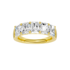 A top-down view of a 14K yellow gold wide band ring with five horizontally-set emerald-cut diamonds, with the center one being larger.