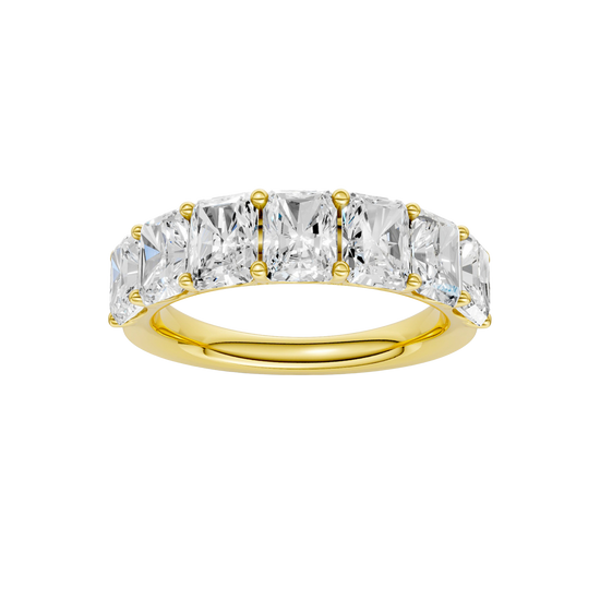 A top-down view of a 14K yellow gold wide band ring with five horizontally-set emerald-cut diamonds.