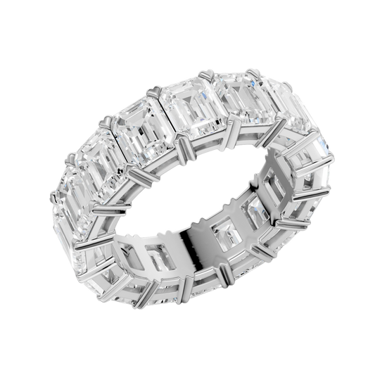 An angled view of a 14K white gold eternity band, highlighting the magnificent sparkle of the rectangular jewels.