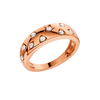 Angled view of the Fourteenth Collection multi-shape diamond dome ring in polished rose gold, featuring star and geometric bezel-set round diamonds with high-shine metal detailing against a black background.