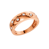Angled studio view of a 14K rose gold multi shape studded diamond statement ring with round lab grown diamonds