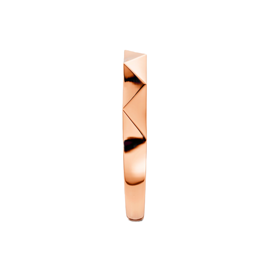 A high-polish 14k rose gold geometric stackable ring by Amorati, featuring a unique multi-angled design. Amorati’s signature F O U R T E E N T H Collection