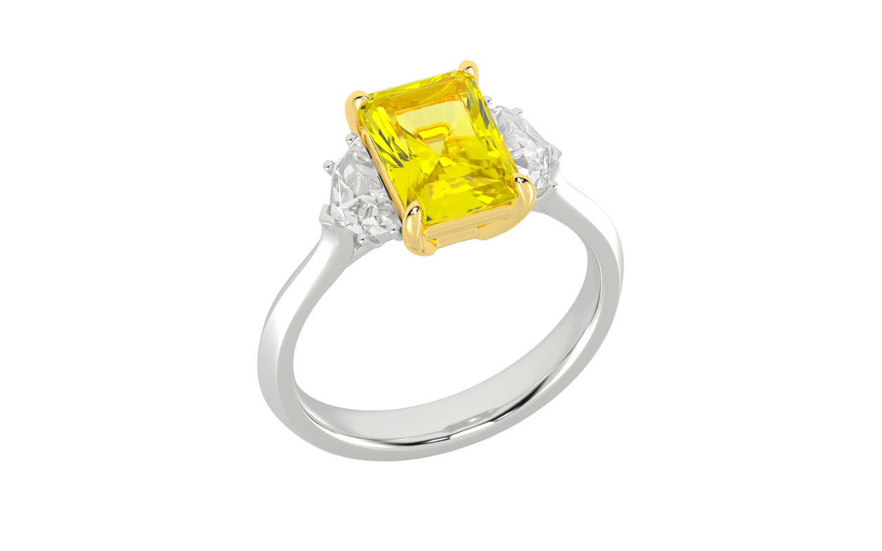Angled view of a white gold three-stone ring featuring a yellow diamond center with white diamond side stones and a polished band.