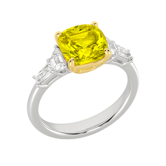 Angled view of a white gold ring featuring a yellow diamond center with white diamond accents and a polished band.