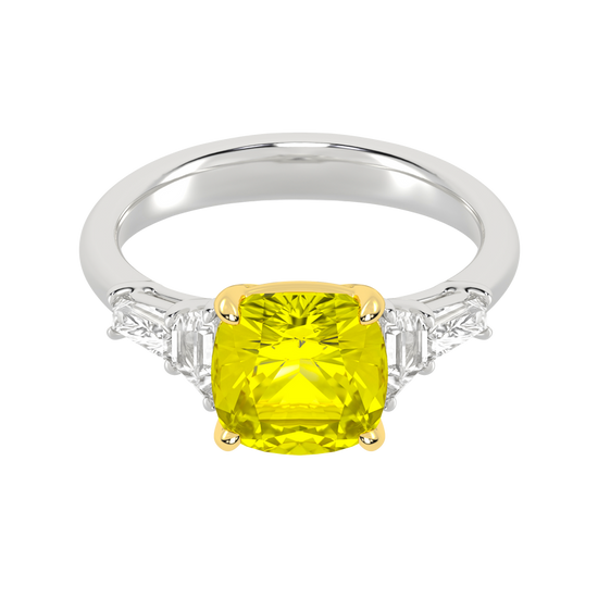 Top view of a white gold ring showcasing a yellow diamond center framed by white diamond side stones.