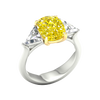 Angled view of an IGI Certified 4.0ct  VS+ Vivid Canary Yellow lab grown diamond center and .66 cttw of VS+ E-F diamond triangle side stones.