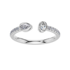 A top-down view of a 14K white gold bypass ring with a pear-shaped diamond on one side and a pavé diamond band on the other