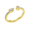 An angled view of a 14K yellow gold bypass ring, showcasing the pear-shaped diamond and the pavé band.