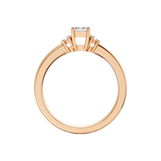 A front view of a 14K rose gold ring, featuring a central rectangular jewel flanked by two smaller round gems.
