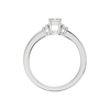 A front view of a 14K white gold ring, featuring a central rectangular jewel flanked by two smaller round gems.