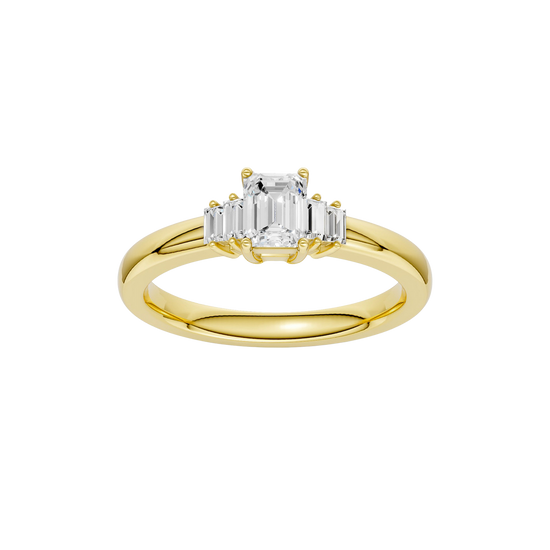 A top-down view of a 14K yellow gold ring with a central rectangular jewel and two smaller round gems on the sides.