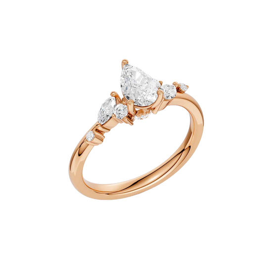An angled view of a 14K rose gold ring, showcasing the brilliant arrangement of the jewels.