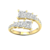 A top-down view of a 14K yellow gold ring with an asymmetrical cluster of princess-cut and baguette diamonds.