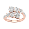 Top-down view of the Amorati bypass diamond ring in 14K rose gold, featuring two parallel rows of shimmering round-cut lab diamonds that overlap in a modern, asymmetrical open-wrap design.