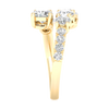 Side view of a yellow gold bypass ring demonstrating the unique "floating" architecture of the diamond clusters. The image shows the polished interior of the 14K gold shank and the precision pavé detailing along the shoulder.