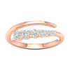 A top-down view of a 14K rose gold open-shank ring with a continuous spiral design and a line of bezel-set round diamonds.