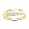 A top-down view of a 14K yellow gold open-shank ring with a continuous spiral design and a line of bezel-set round diamonds.