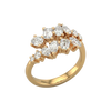An angled view of a 14K yellow gold ring, showcasing the brilliant, mixed-shape diamond cluster.
