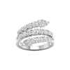 A top-down view of a 14K white gold open-shank ring with a continuous spiral design and a pavé diamond surface.