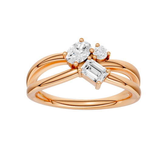 A top-down view of a 14K rose gold bypass ring with a central cluster of three horizontal baguette diamonds.
