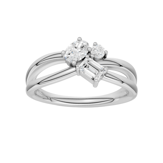 A top-down view of a 14K white gold bypass ring with a central cluster of three horizontal baguette diamonds.