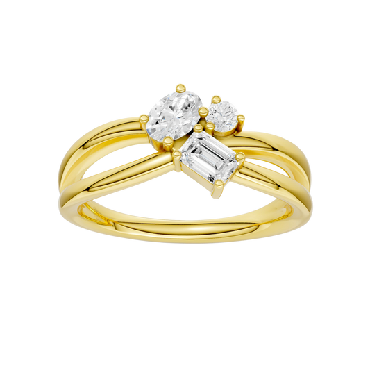 A top-down view of a 14K yellow gold bypass ring with a central cluster of three horizontal baguette diamonds.