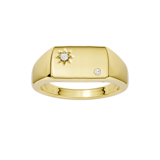 A top-down view of a 14K yellow gold signet ring with a sunburst motif and a brilliant round jewel.