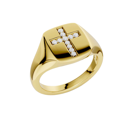 An angled view of a 14K yellow gold signet ring, showcasing the pavé jewel cross design.