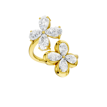 Top down view of a yellow gold floral diamond ring showcasing marquise-cut white diamonds arranged in a symmetrical flower pattern, highlighting the petal layout, diamond brilliance, and polished gold setting.
