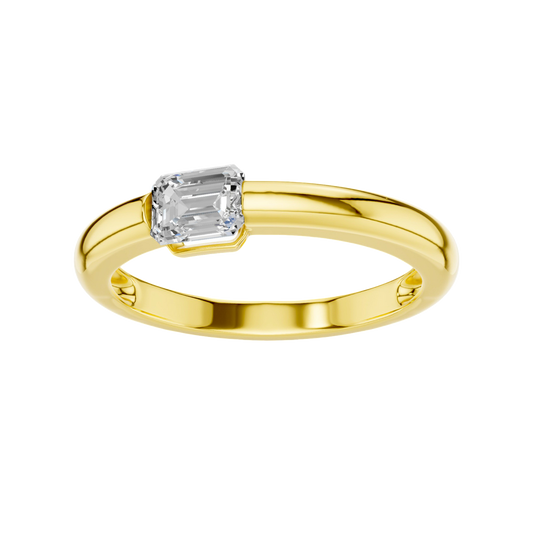 A top-down view of a 14K yellow gold ring with a series of horizontal, square-cut diamonds.